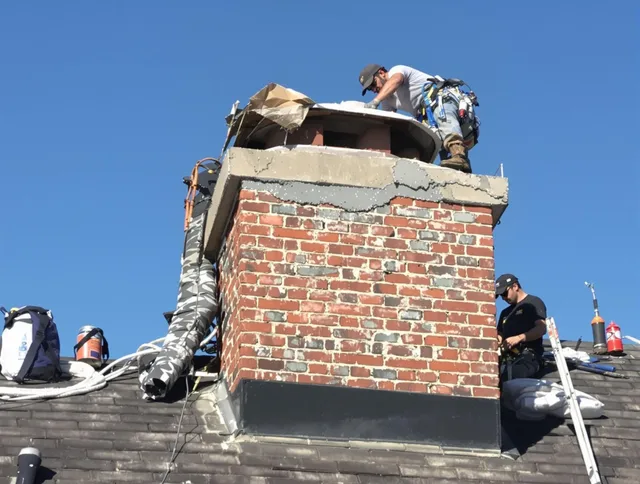 Riverview Chimney Sweep installing a custom chimney crown in Riverview, FL