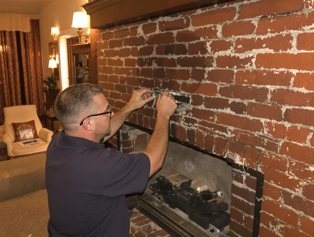 Riverview Chimney Sweep expert fixing a fireplace in Riverview, FL